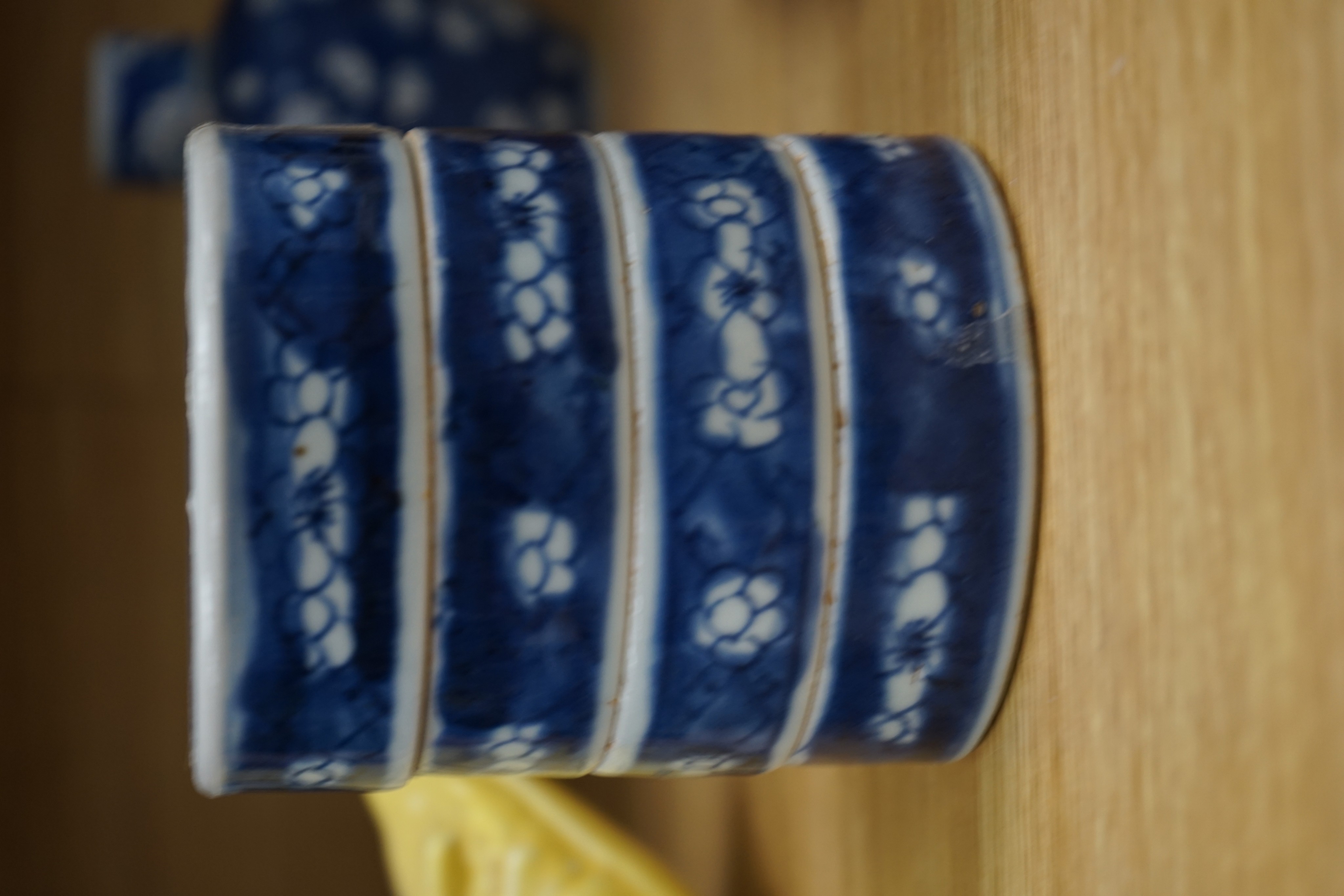 A Chinese blue and white ovoid jar and cover and similar stacking box, Kangxi and a Qing blue and white footed cup, tallest 15cm